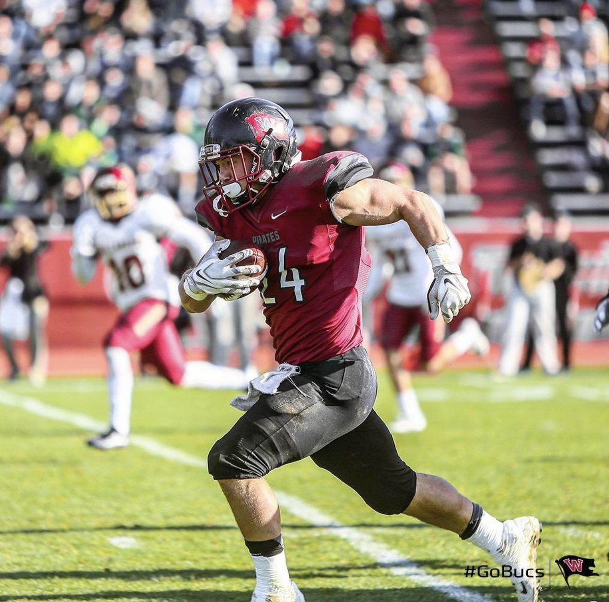 Duke DeGaetano carries the ball for Whitworth University