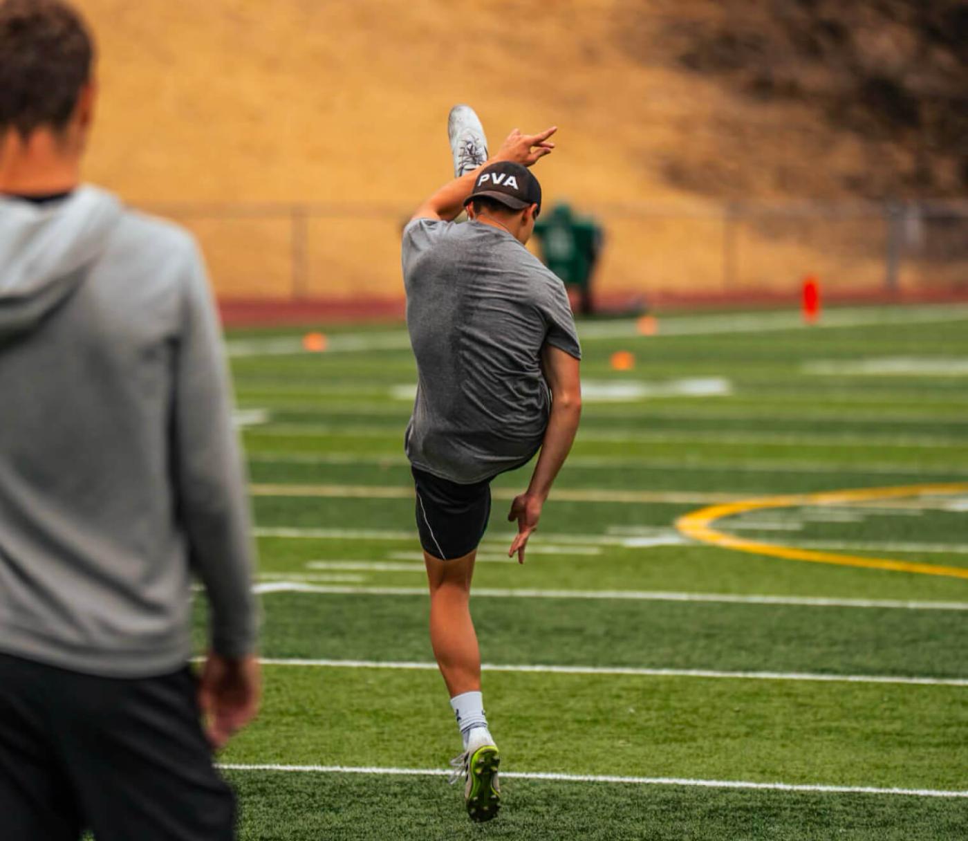 A kicker finishes a kick during a field session